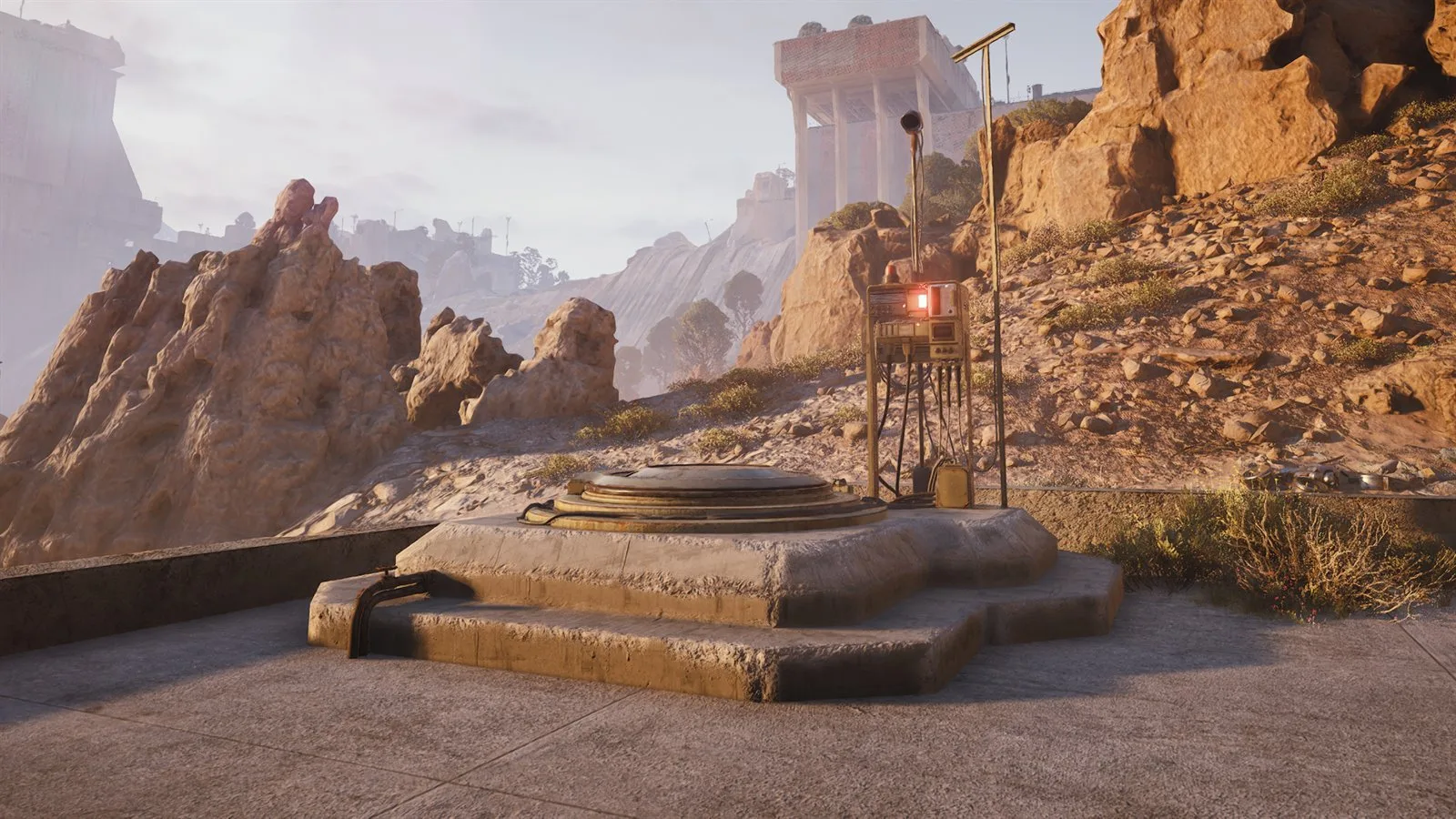 A Raider Hatch: a round metal hatch set in a concrete pad with a lit terminal on a post beside it