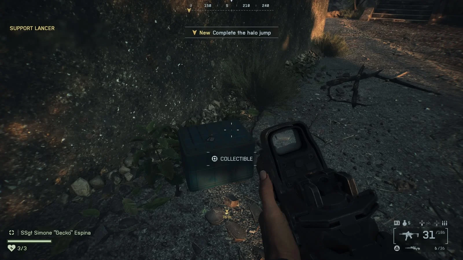 Dark first-person view of a small dark-green crate against a rock wall with a dog tag on top and a Collectible prompt, while the objective reads Complete the halo jump