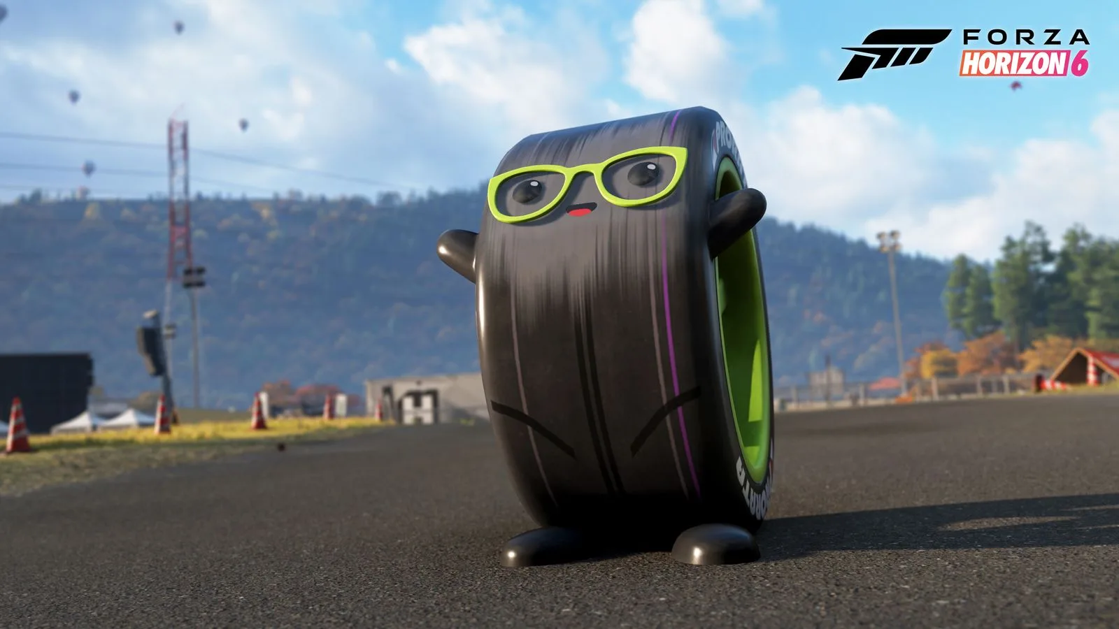 The Drift Tire Mascot collectible, a cartoon tire with green glasses, standing on the track at Shimanoyama in Forza Horizon 6