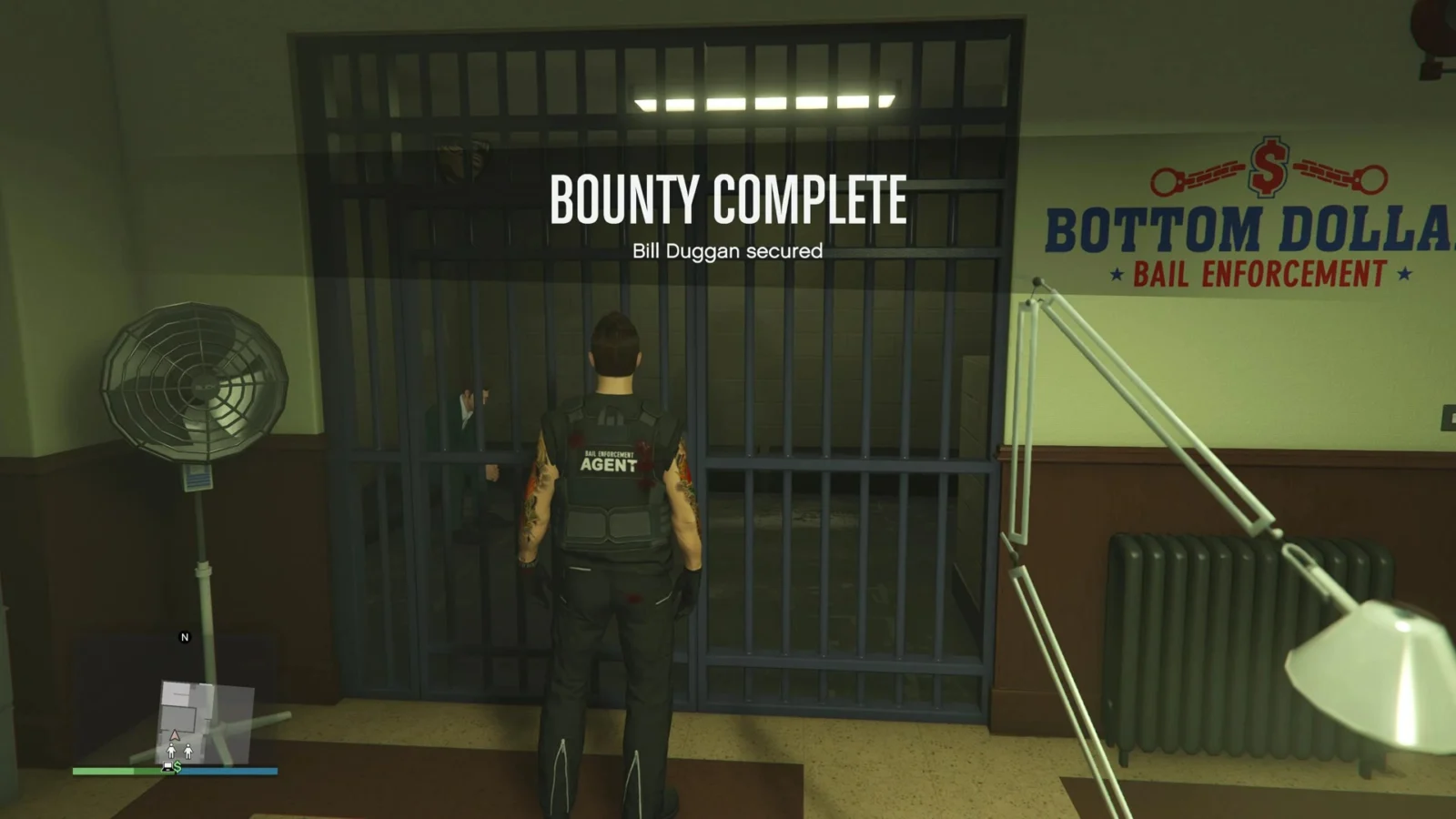Bounty Complete screen in GTA Online after a target is locked in the Bail Office holding cell