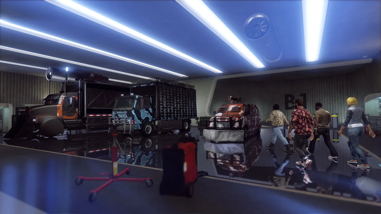 Delivery garage under a GTA Online nightclub with the Speedo Custom, Mule Custom and Pounder Custom