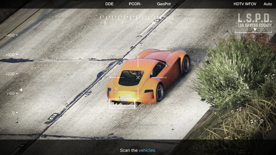 A Vehicle Cargo source mission in GTA Online, seen through an LSPD helicopter camera scanning an orange sports car on a highway
