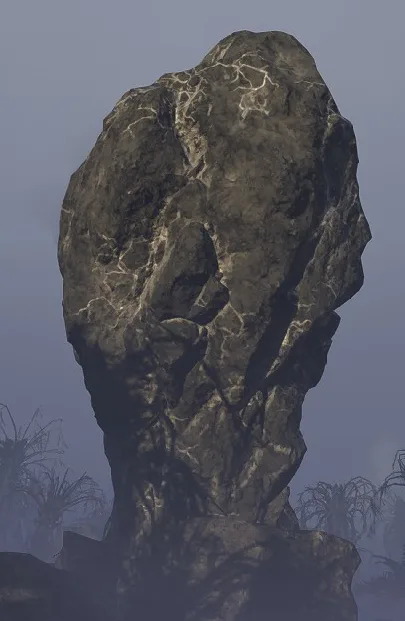 The Super Sample Rock, a bulbous grey rock with bright silver veins running through it, on a rocky hillside