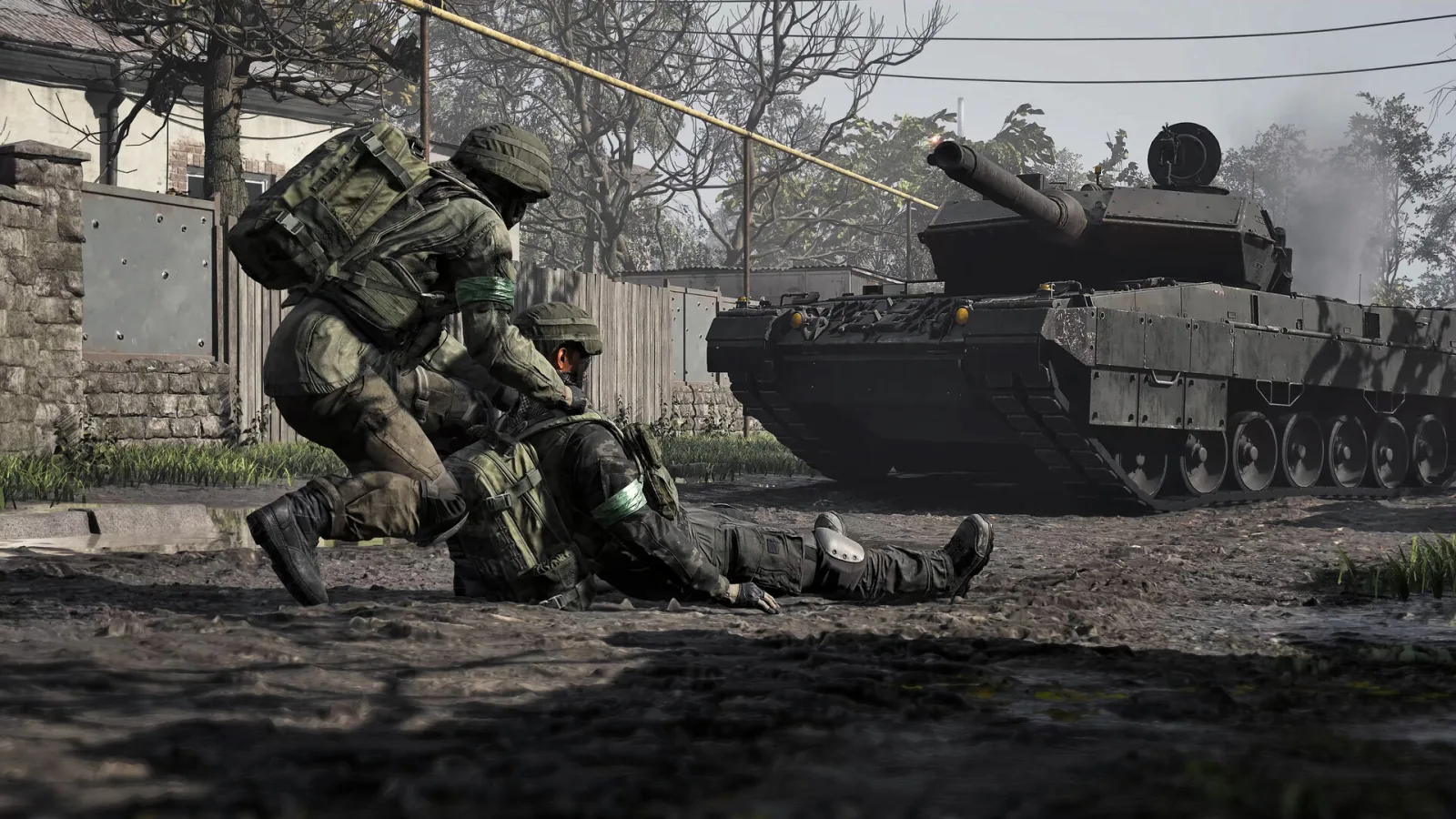 A Wardogs player dragging a downed teammate to cover while a tank fires in the background