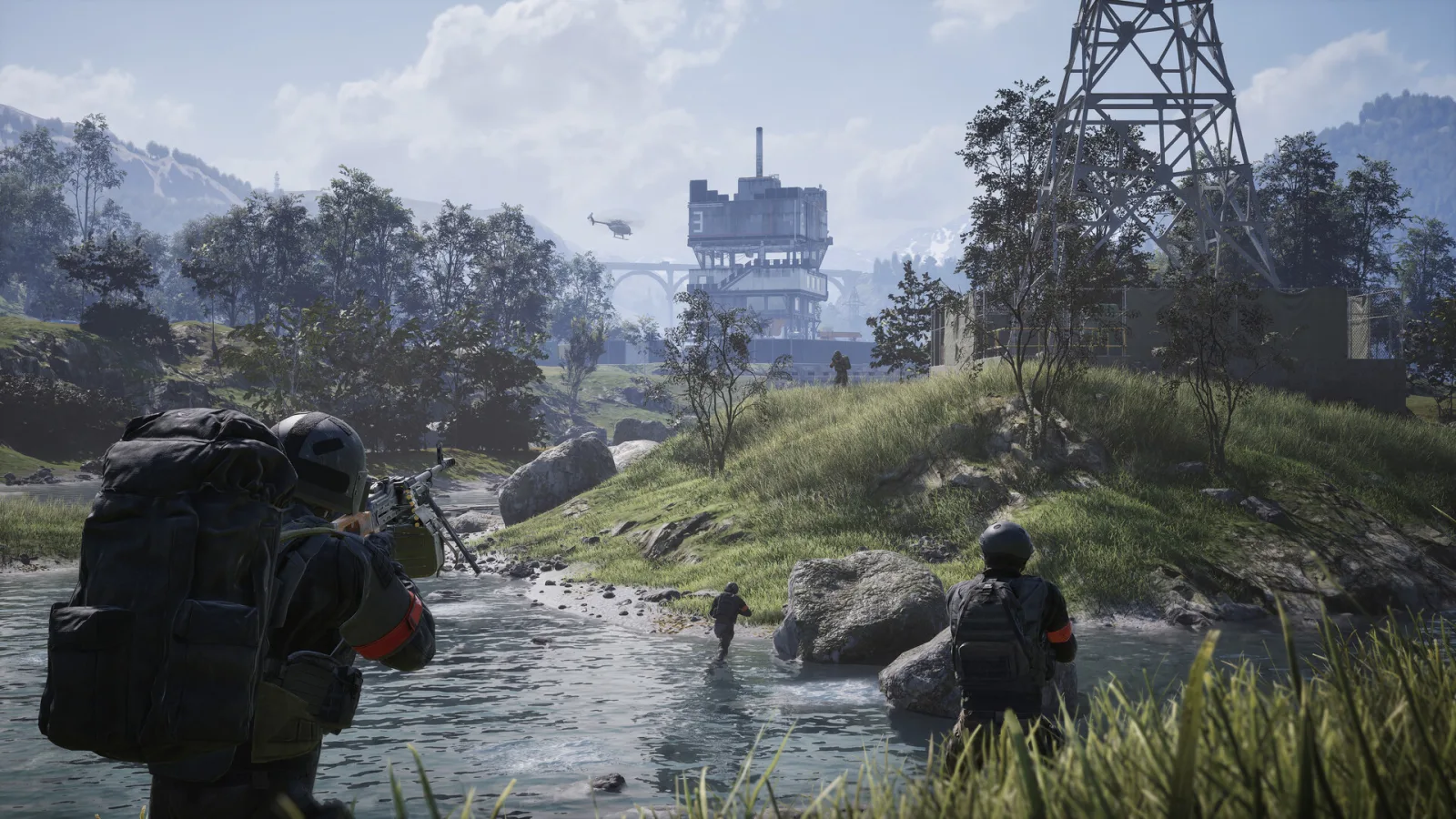 A squad wades across a river toward a hill with a large concrete tower and a helicopter in the sky