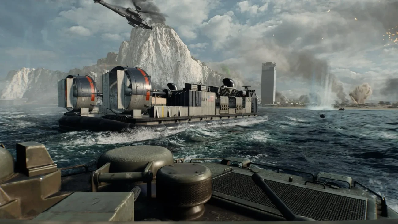 Battlefield 6 campaign screenshot: a US Navy LCAC hovercraft crossing rough water toward the Rock of Gibraltar under an attack helicopter, with smoke and shell splashes along the shore