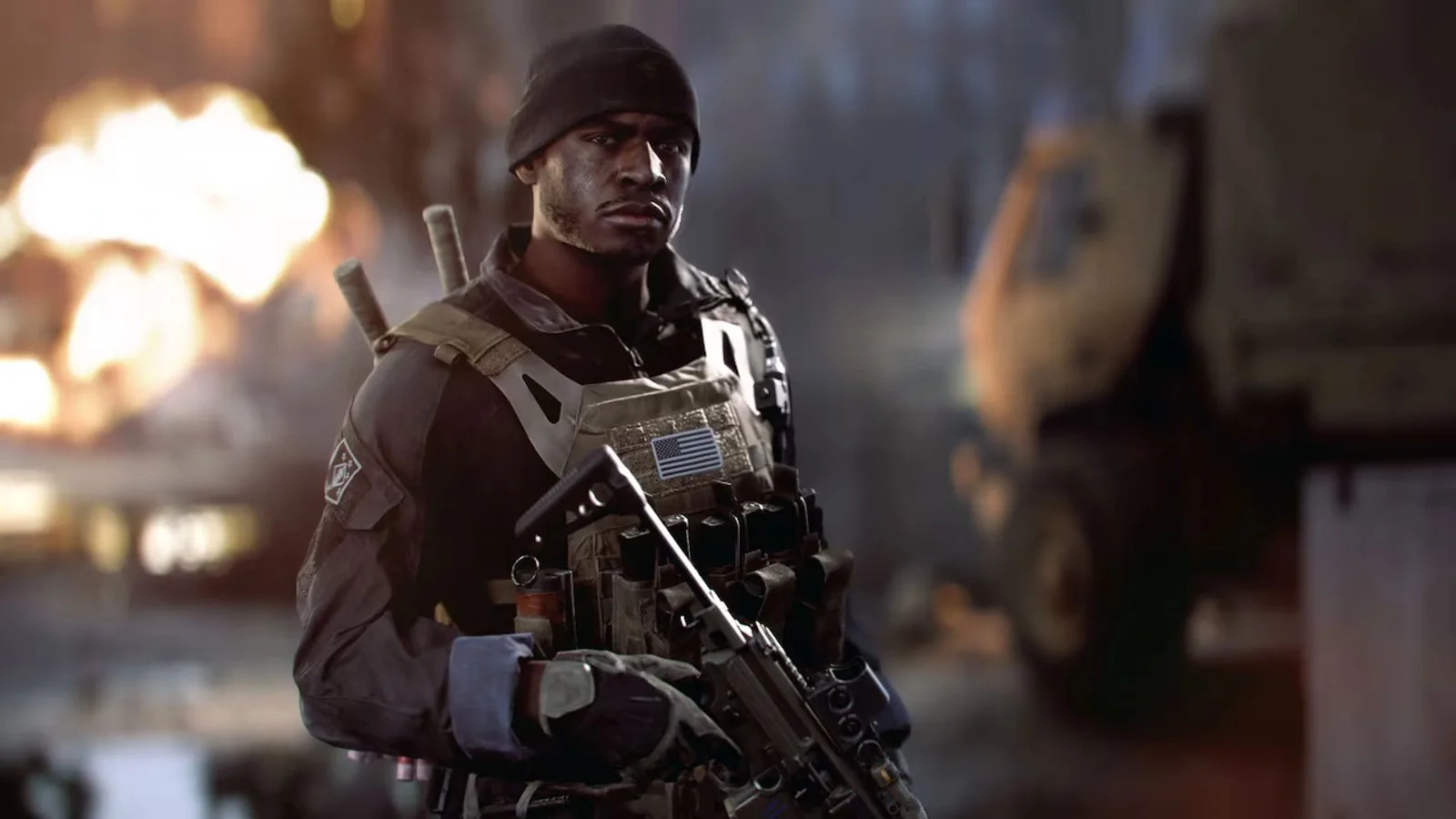Dylan Murphy, the Dagger 1-3 Engineer in the Battlefield 6 campaign, in a black beanie and plate carrier holding a rifle with an explosion blurred behind him