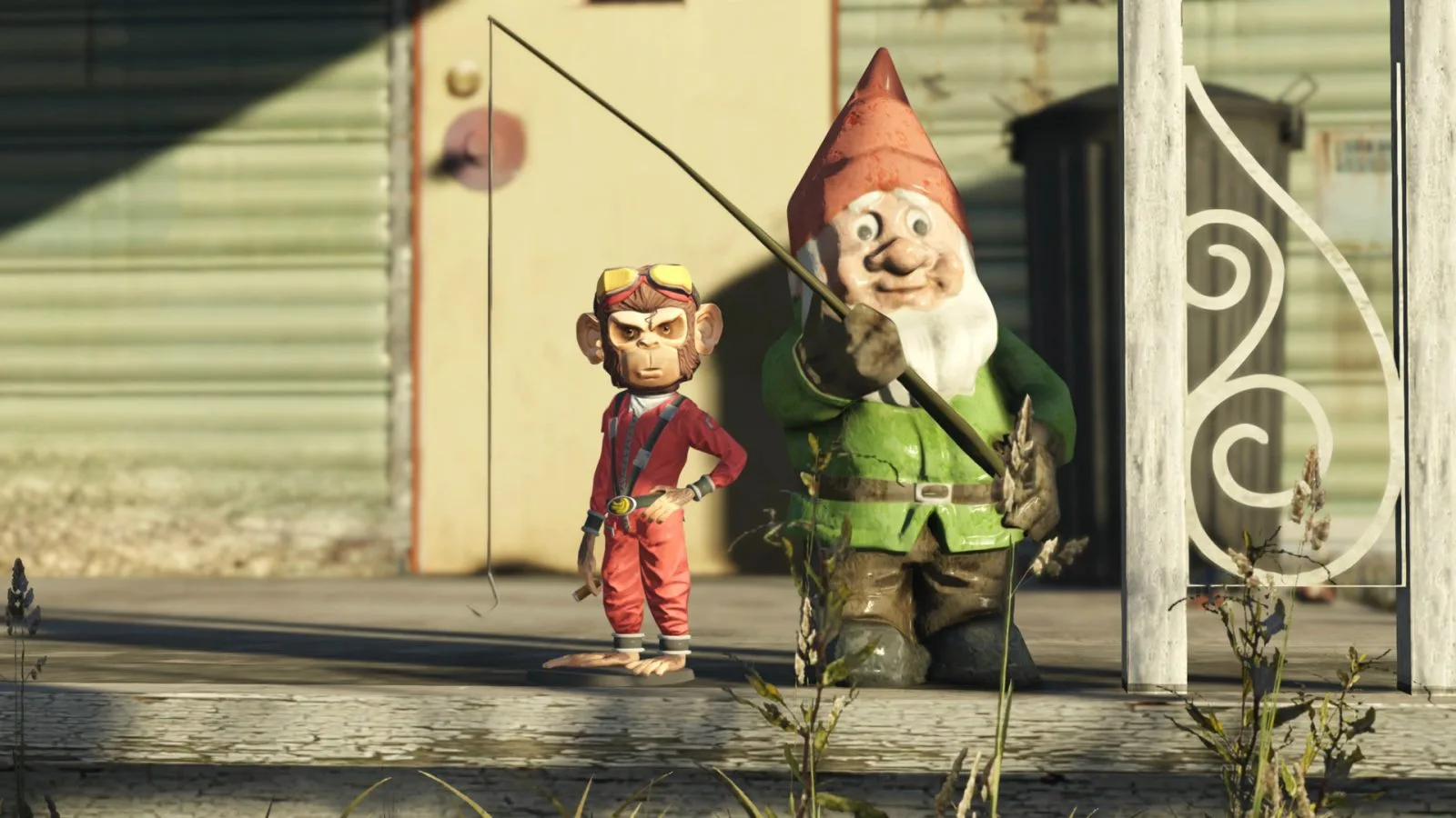 A monkey pilot action figure and a garden gnome holding a fishing rod on a porch
