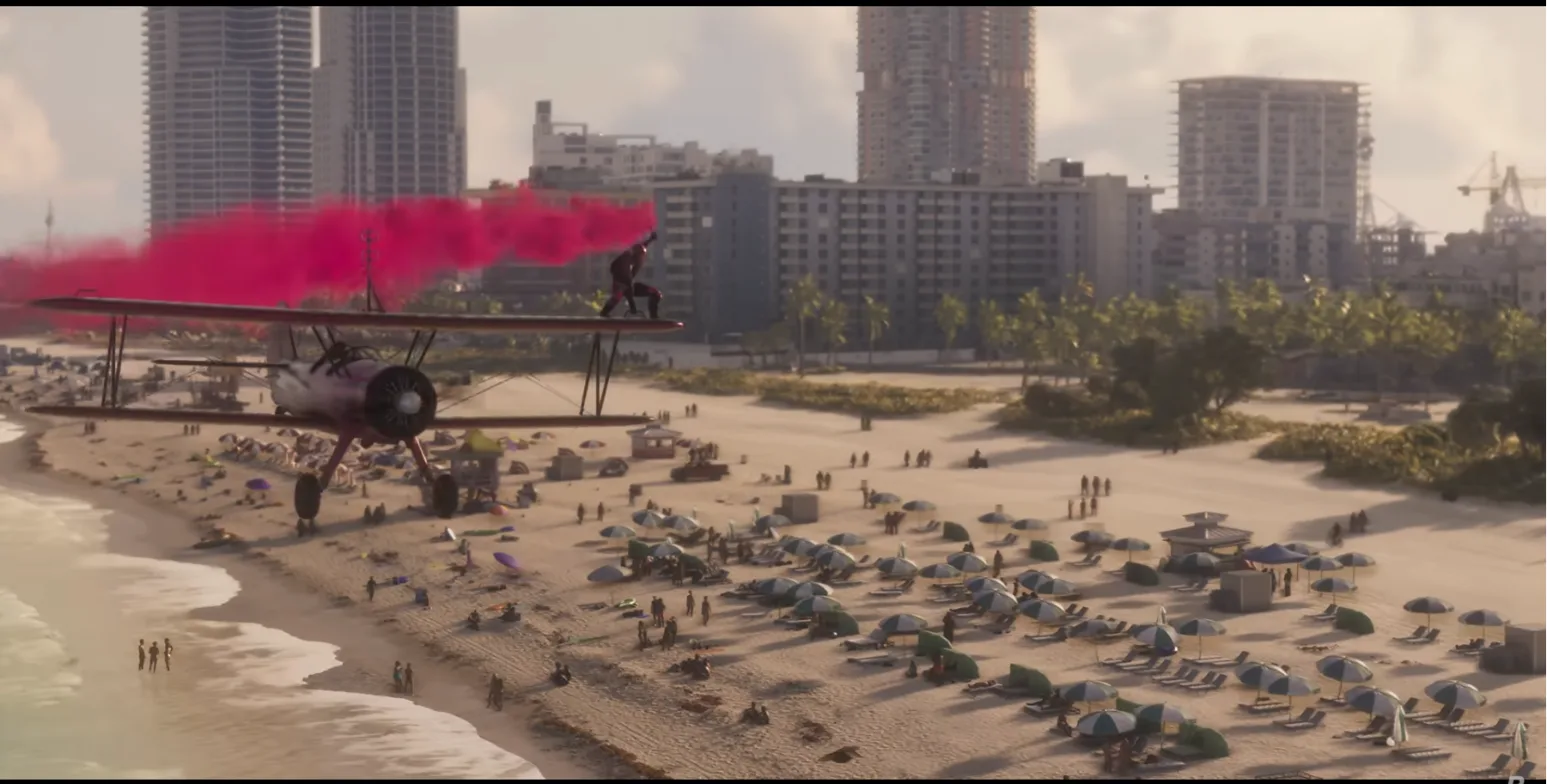 A wing-walker stands on a red biplane trailing pink smoke low over a crowded Vice City beach with high-rise hotels behind