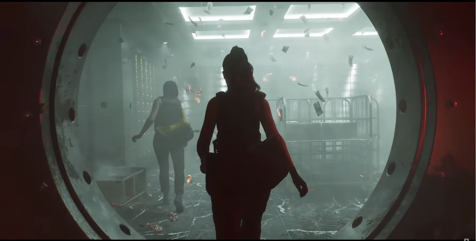 Two women with bags walk through an open round vault door into a smoky vault with banknotes in the air