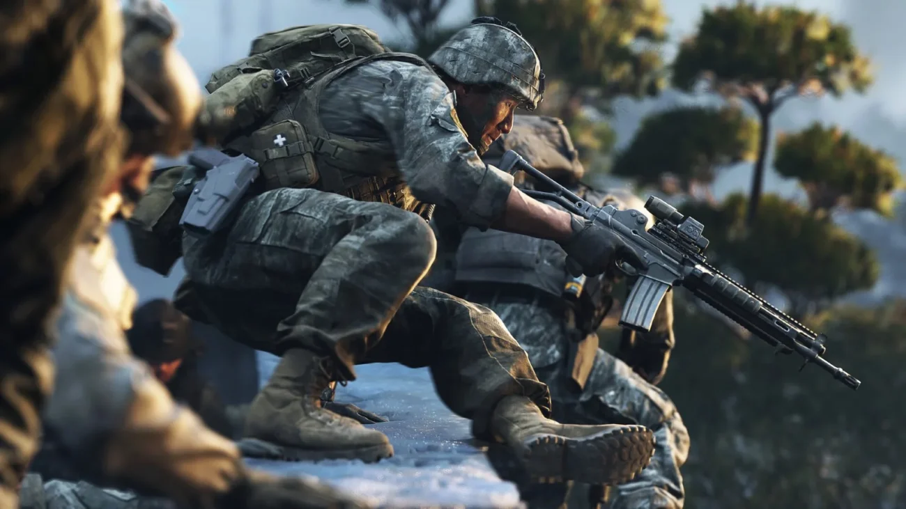 Modern Warfare 4 soldiers in camouflage uniforms advancing in a crouch through snow
