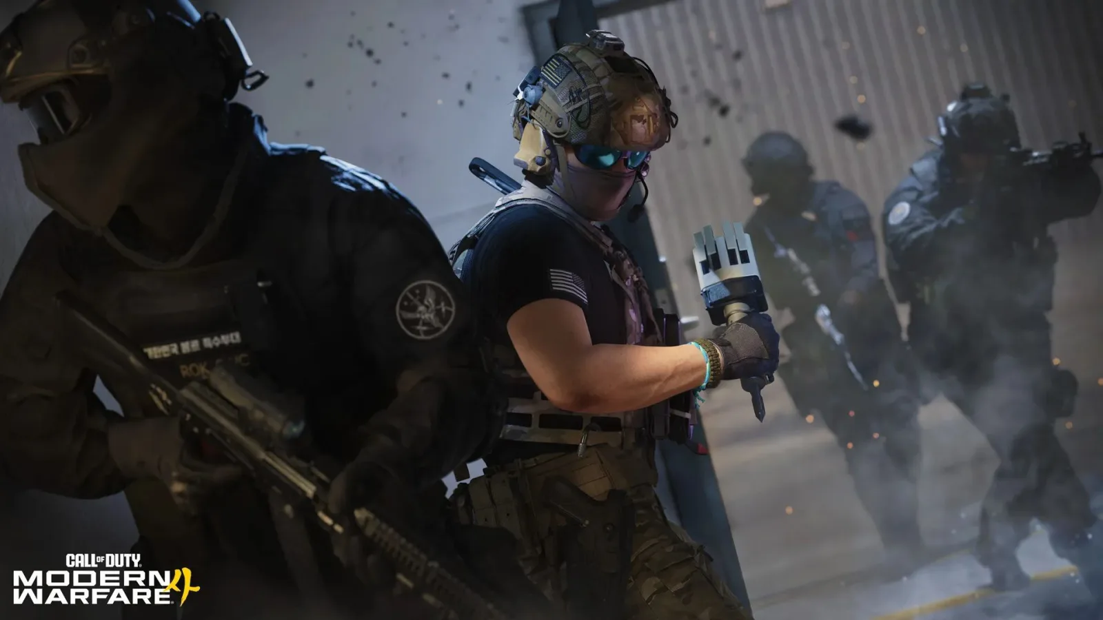 Modern Warfare 4 Hijack image: an operator in sunglasses holds a white handheld device while teammates breach a doorway behind him