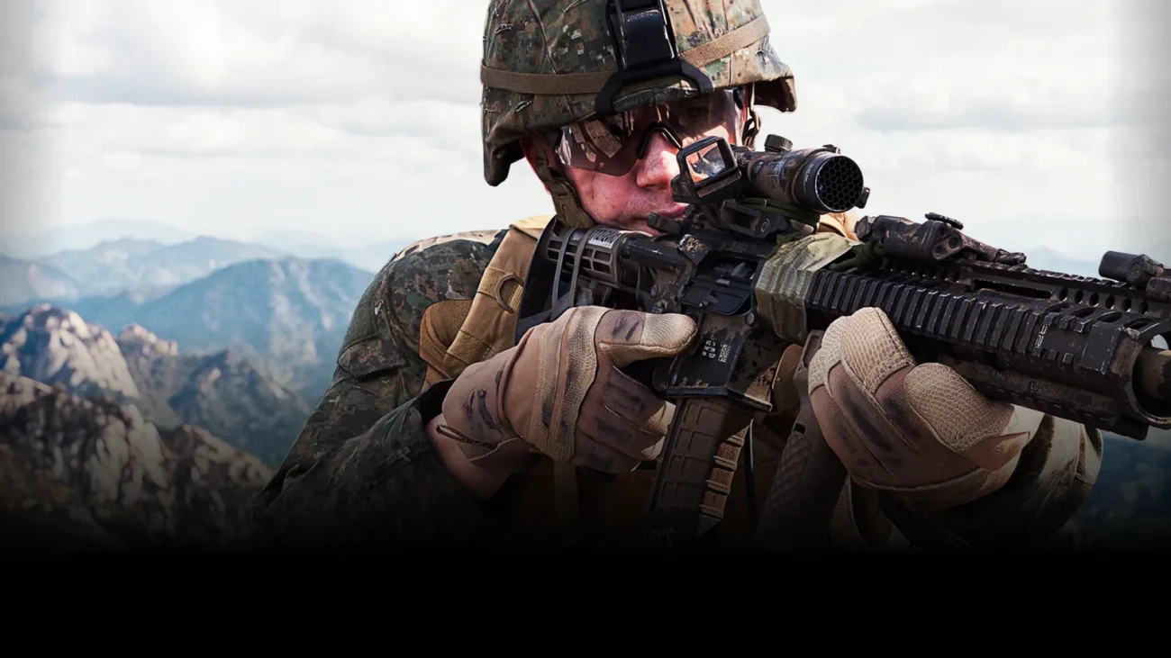 Soldier in woodland camouflage aiming an M4 rifle on a mountain ridge, from the MW4 Valor Pack store page
